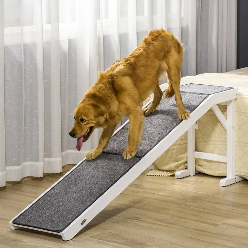 Dog walking down The Voyager high-traction pet ramp in a modern home | WagWondersPro