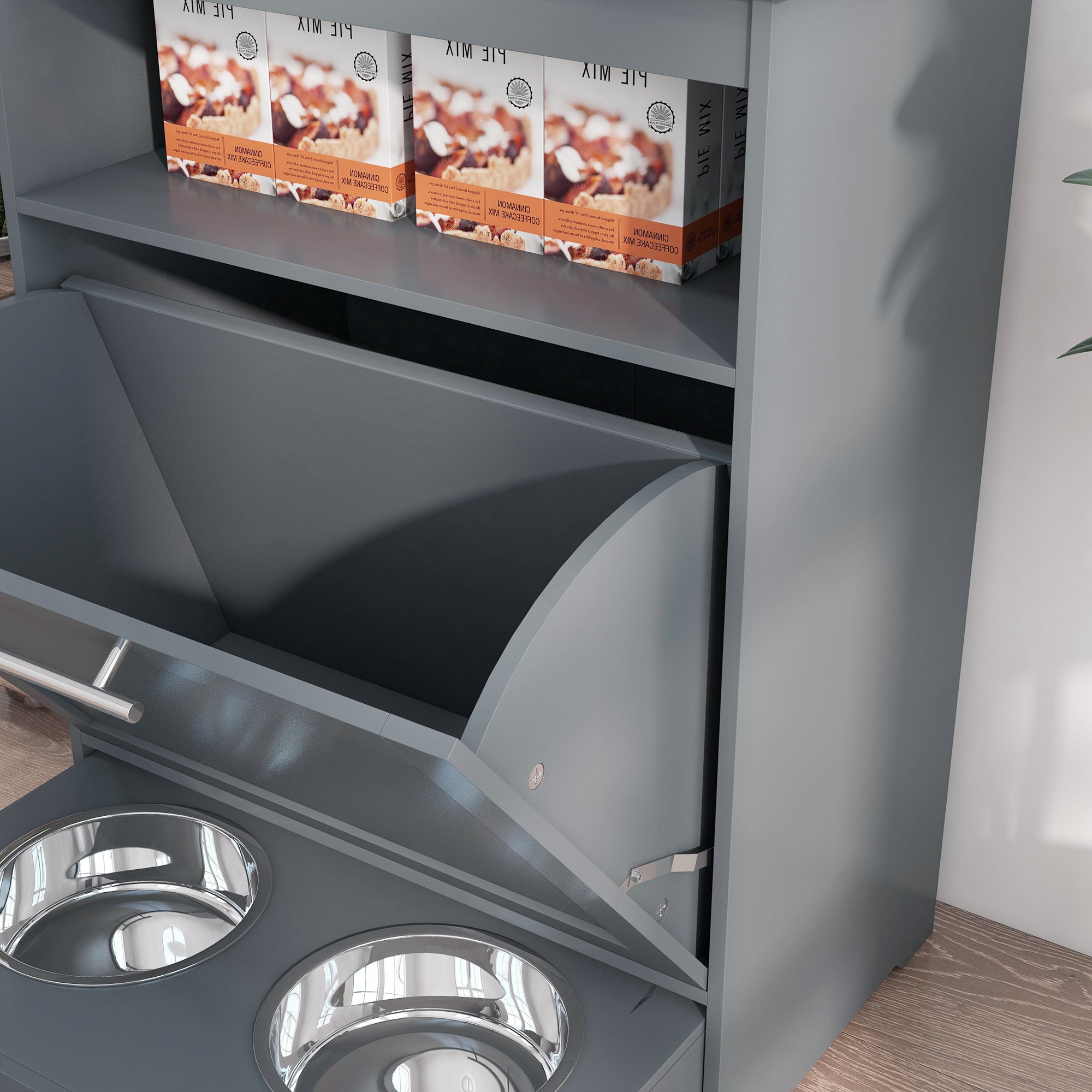 Gray pet feeder with two stainless steel bowls and two boxes on a shelf.