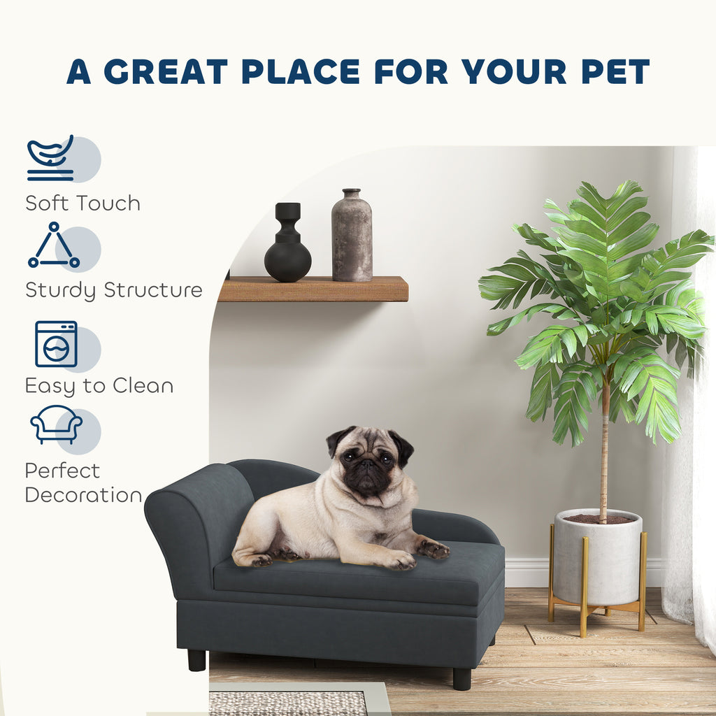 pug on grey pet bed in room with plant